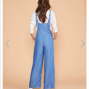 Lou and grey overalls